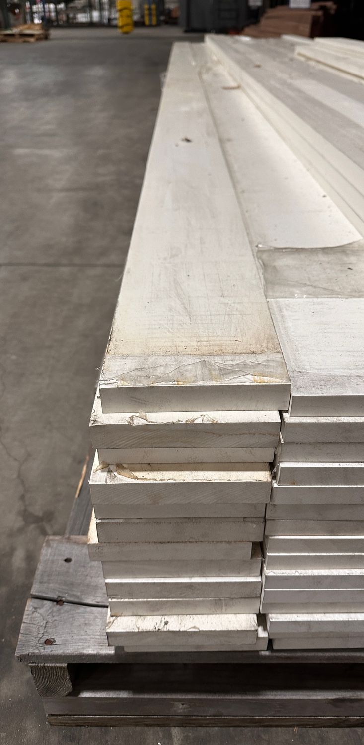 Wolf 5/4 in. x 6 in. x 18 ft. Smooth PVC Trim (Warehouse Seconds)