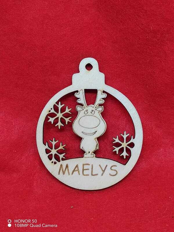 Boule de Noël en bois personnalisée avec texte et motif découpés laser