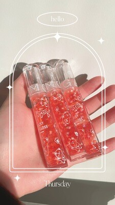 lucky lipgloss ~ orange tinted