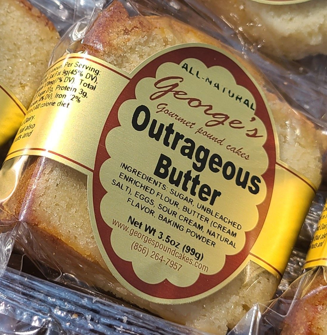 George's Perfect Pound Cake book (signed Copy) with a slice.