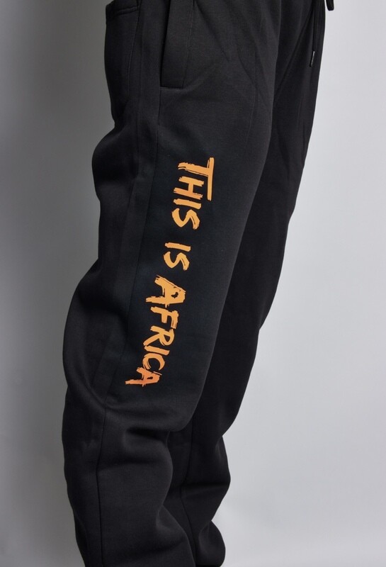This is Africa ® Sweatpants noir / orange UniSex