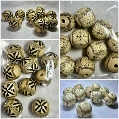 Perles avec motifs en sachet