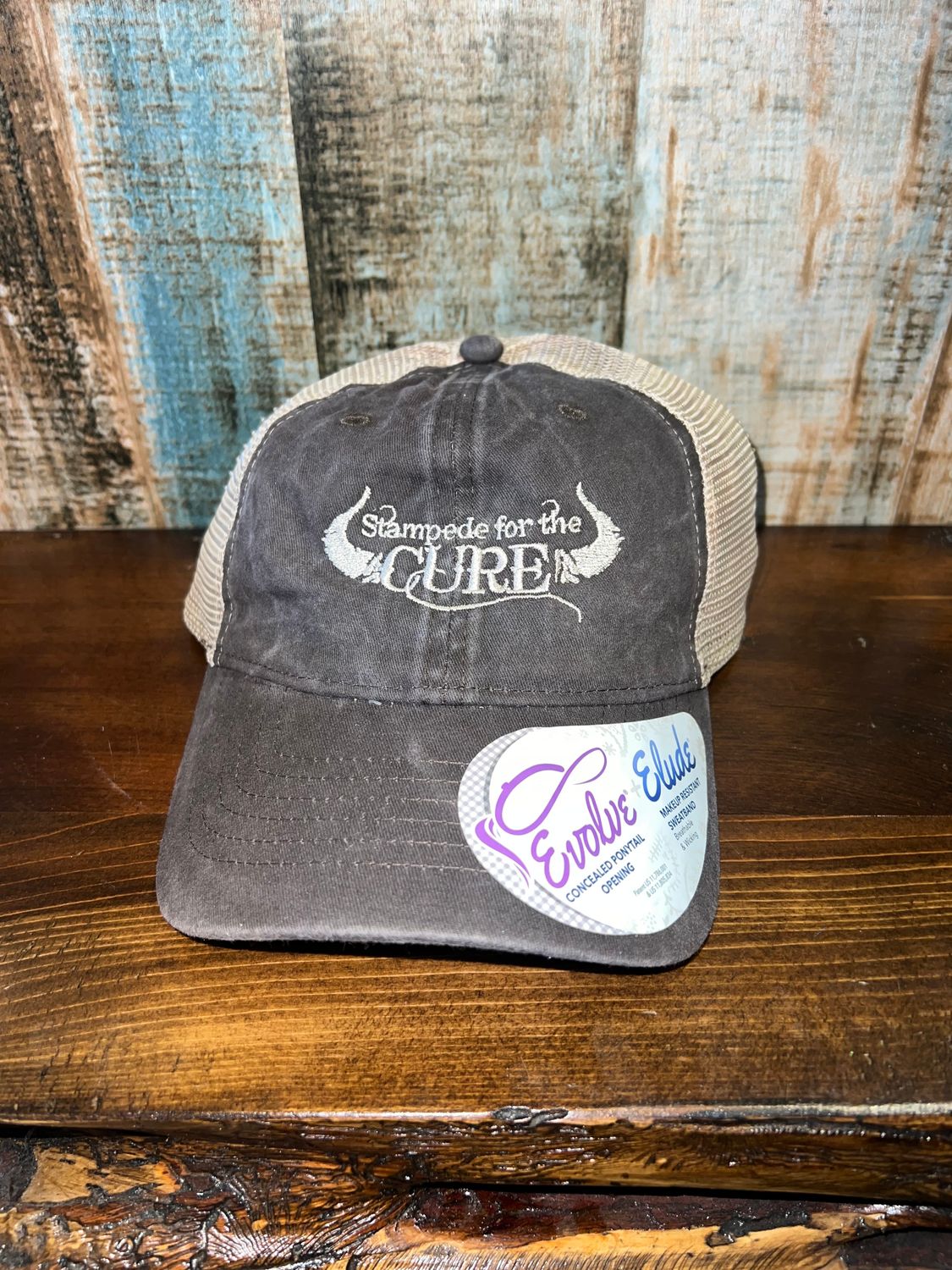 Brown hat with tan mesh
