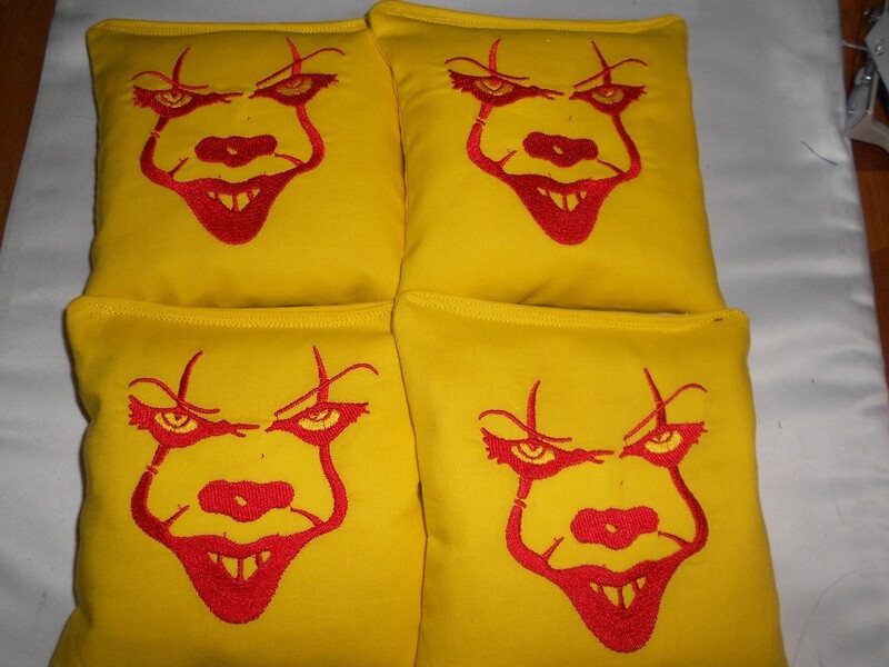Yellow Face Embroidered Set of 4 bags