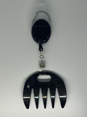 Grat-grat noir moucheté or,  clipper diamants noirs dans son coffret cadeau.