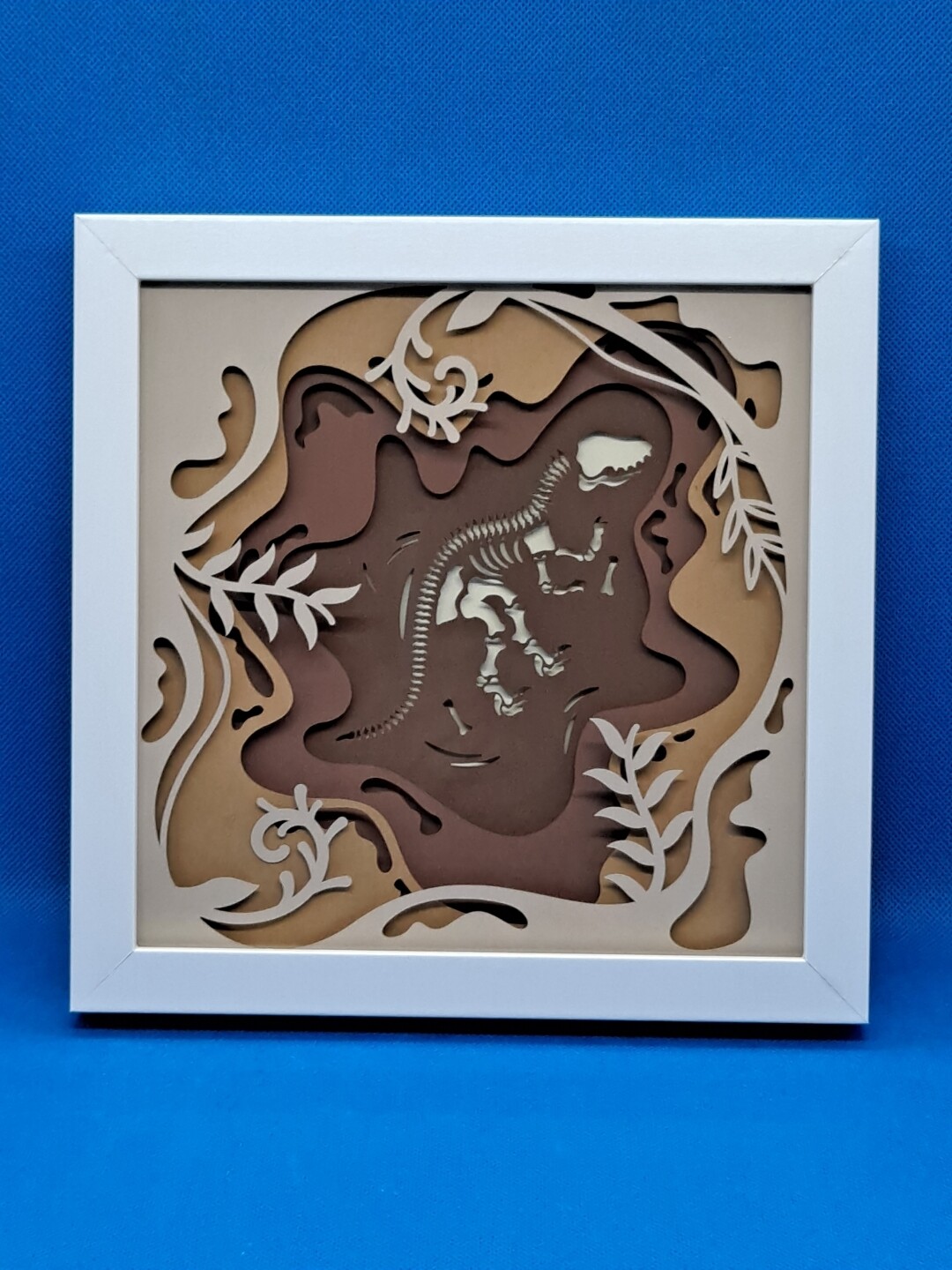 T-Rex Fossil in the Ground Layered 8x8 inch shadowbox