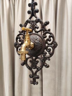 Bronzos kranelis su metaliniu dekoru