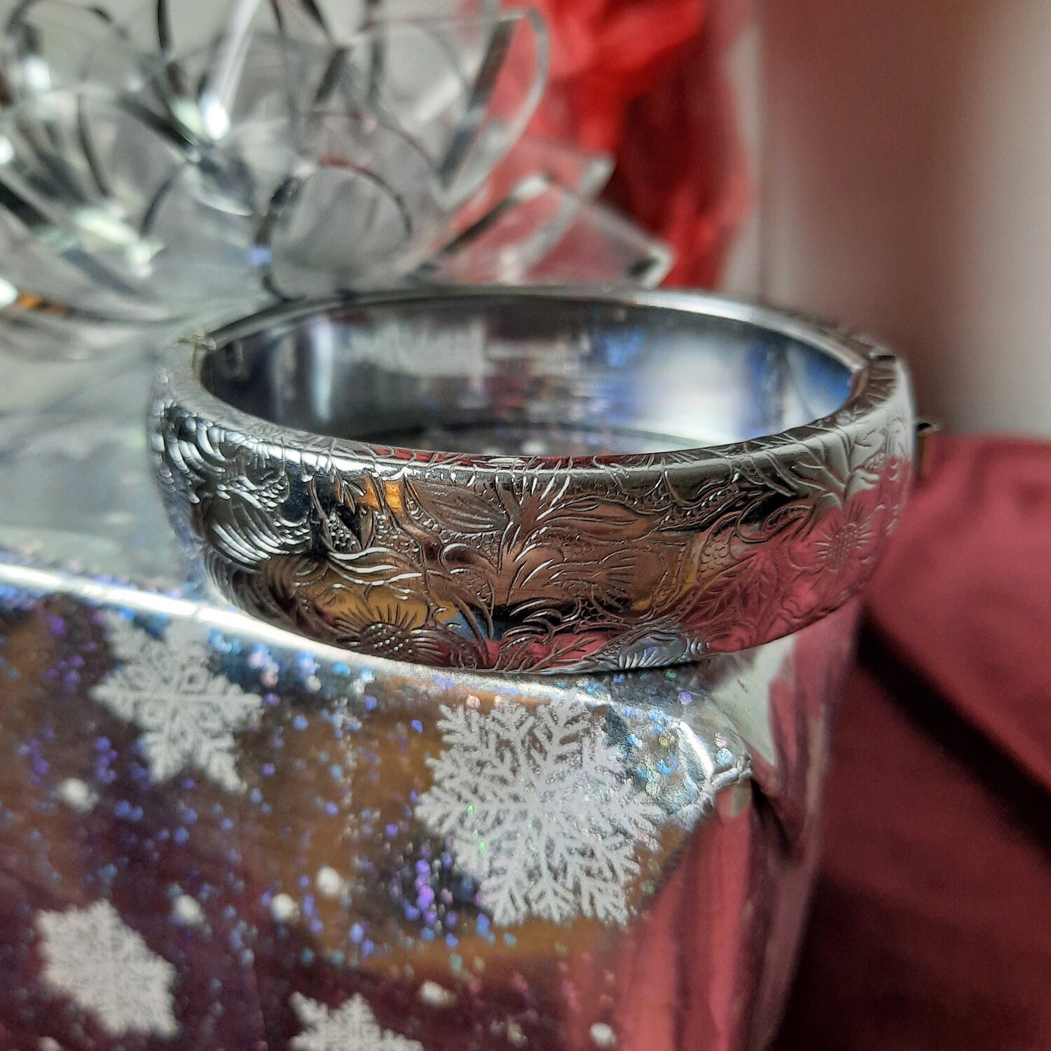 Silver Tone Hinged Bangle With Safety Chain and Intricate Floral Etched Design c. 1970's