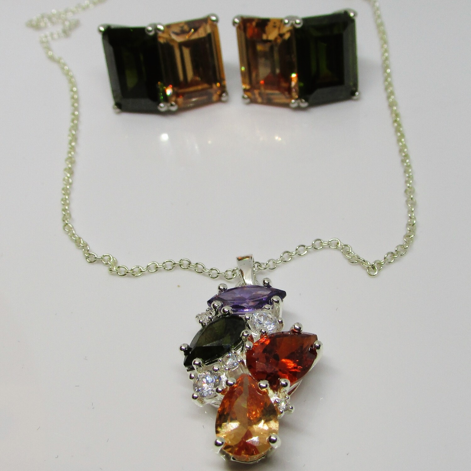 Avon's Dare to Dazzle Multi-Coloured Crystal Necklace with Emerald Cut Clip-on Earrings c. 2010