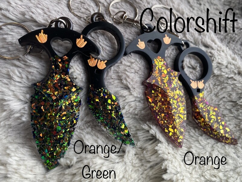 Middle Finger Self Defense Blade Keychain