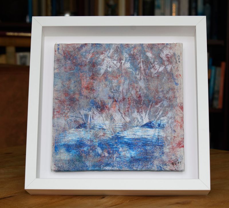Monoprint on rice paper, called The Cove, made by mixed media artist Françoise Vaal. The Cove is shown in a white wooden frame.
