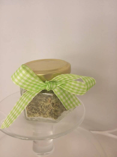 Grated oregano in a jar