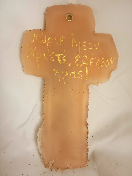 Handmade unique cross, made by sand and  wax.