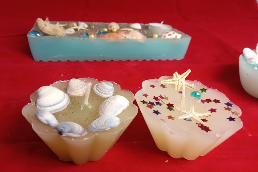 Unique handmade botanical decorative candles, two different pieces