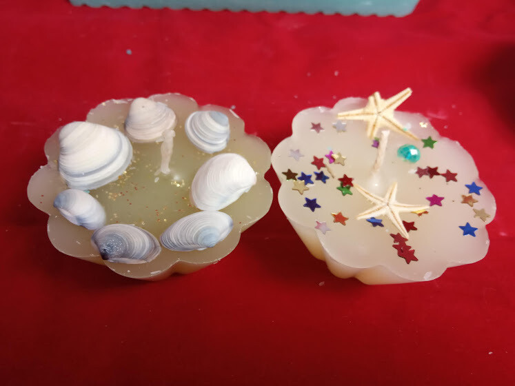 Unique handmade botanical decorative candles, two different pieces