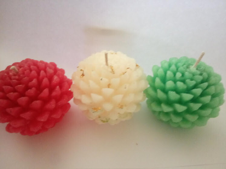 Set of three pine cone candles