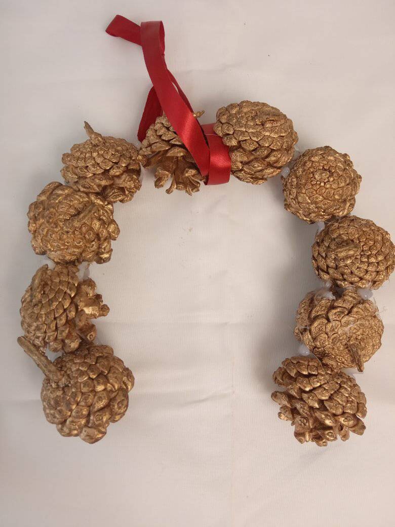 Handmade unique large decorative horseshoe charm from gold pine cones