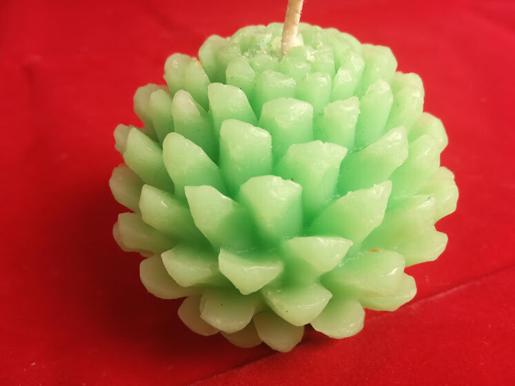 Handmade wax candle, pine cone