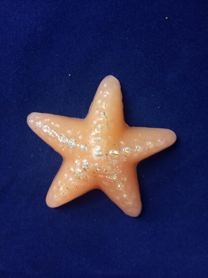 Sea star candle with glitter