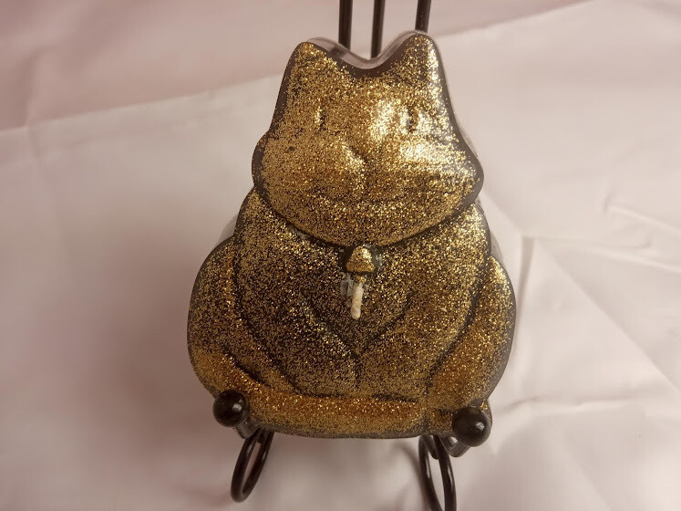 The black golden cat candle, handmade, with glitter