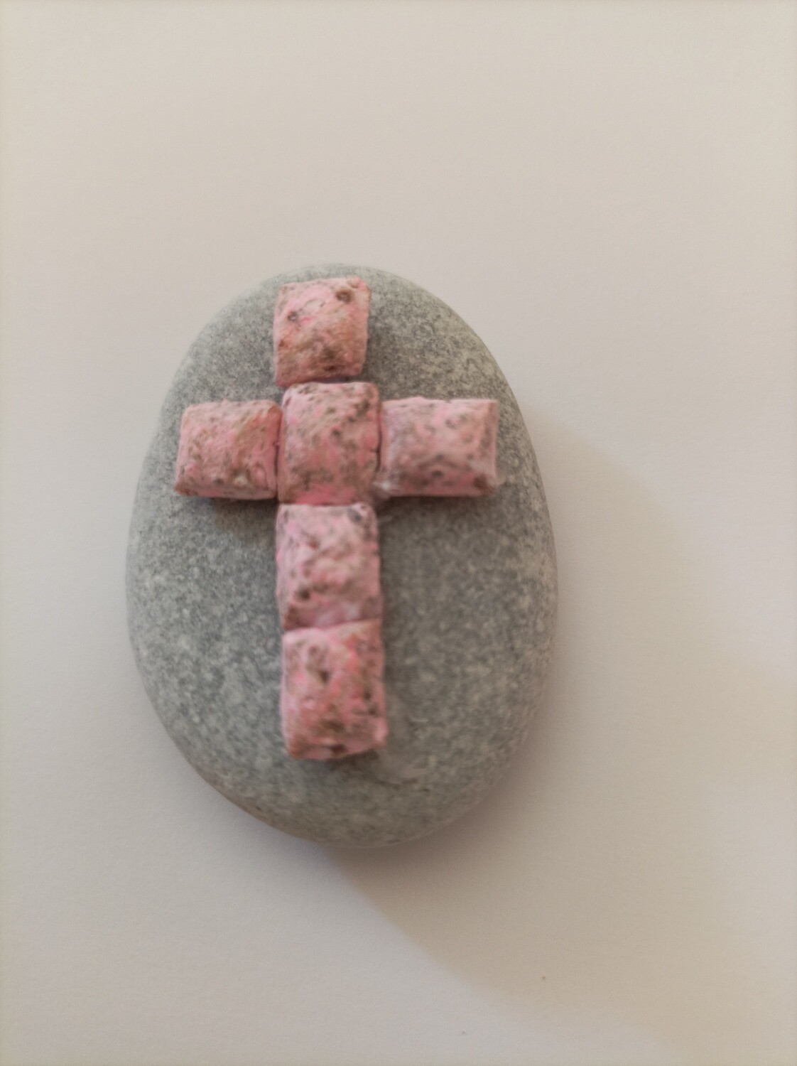Sea stone with cross from aromatic incense