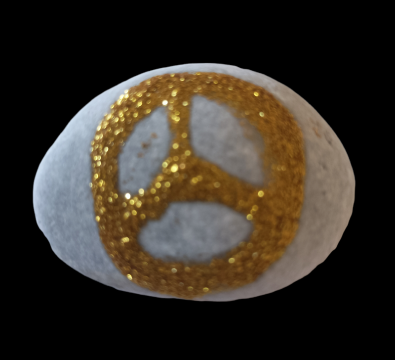 Sea stone with the symbol of peace