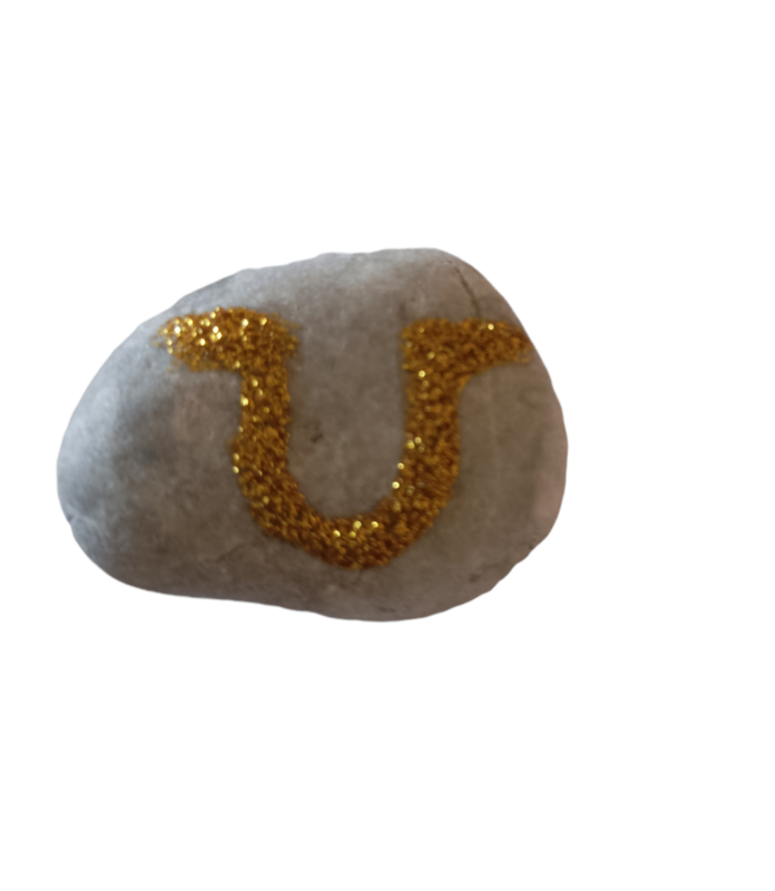 Sea stone with the lucky horseshoe symbol