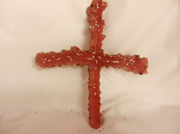 Handmade unique cross, made by sand and  wax.