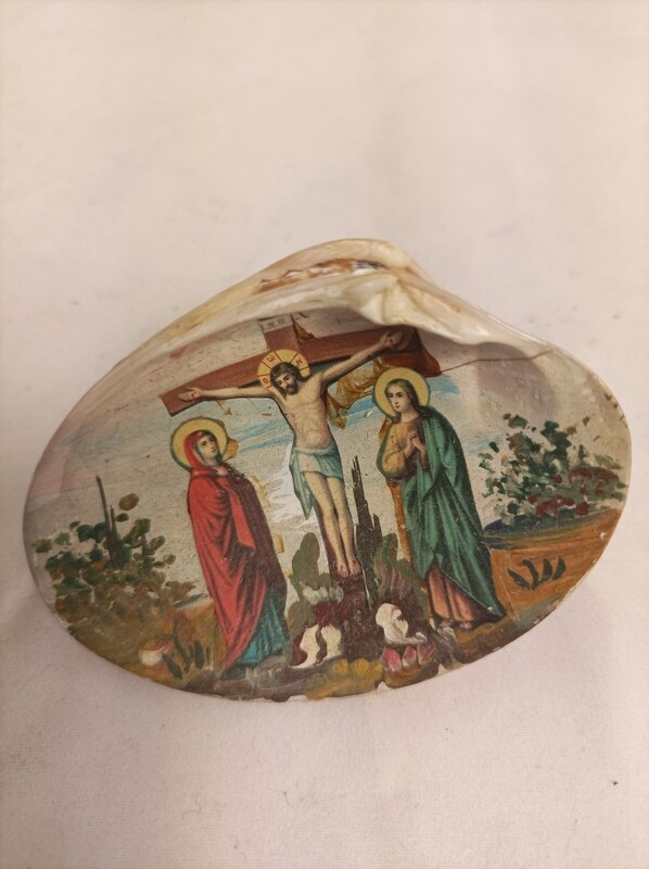 Cross painting in sea shell