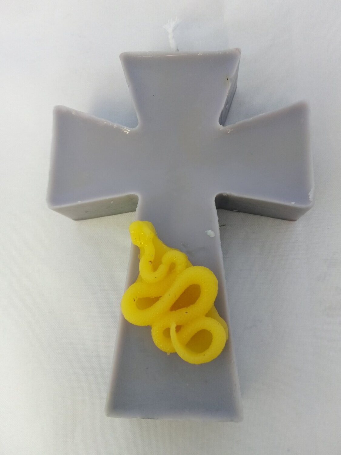cross candle with snake