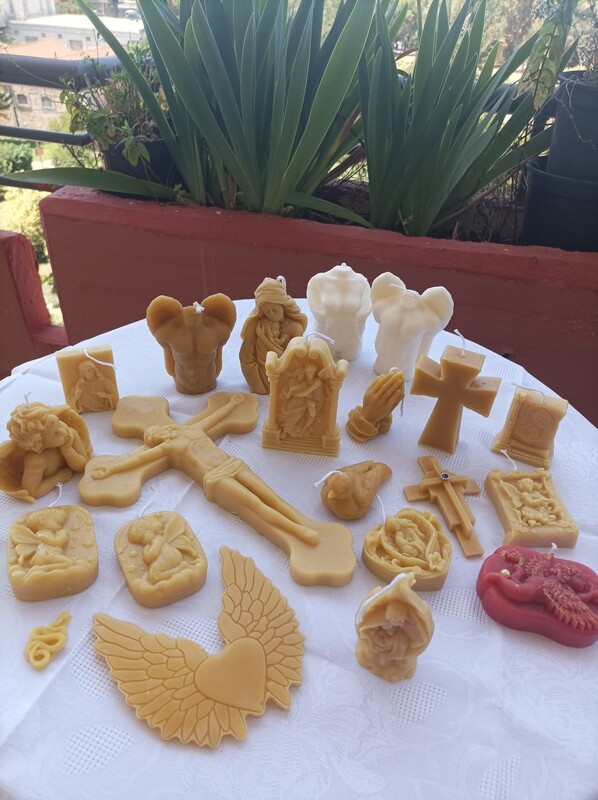 Set of 17 pure beeswax religious candles and 4 pure beeswax icons or melts.