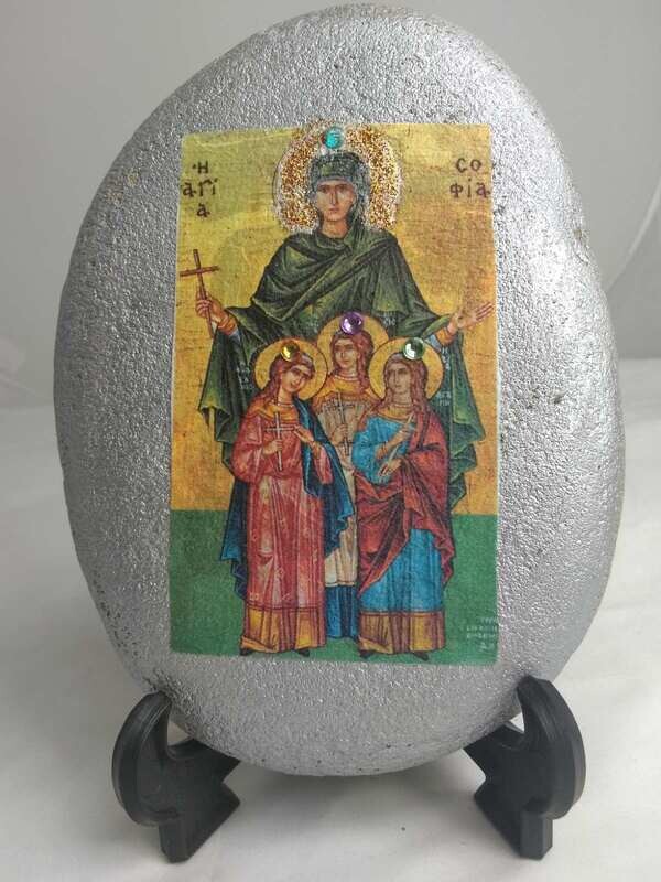 Saint Sofia and her daughters, Faith, Love and Hope, Pisti, Agapi and Elpis in a sea stone.