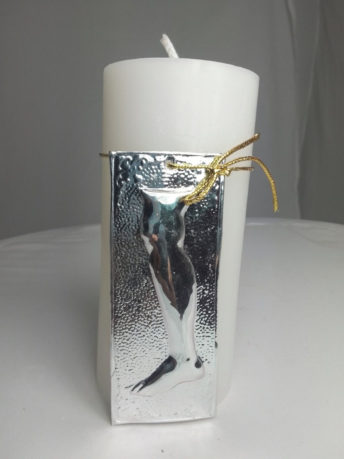 Handmade religious candle with ex-voto, ecclesiastical tama, left leg