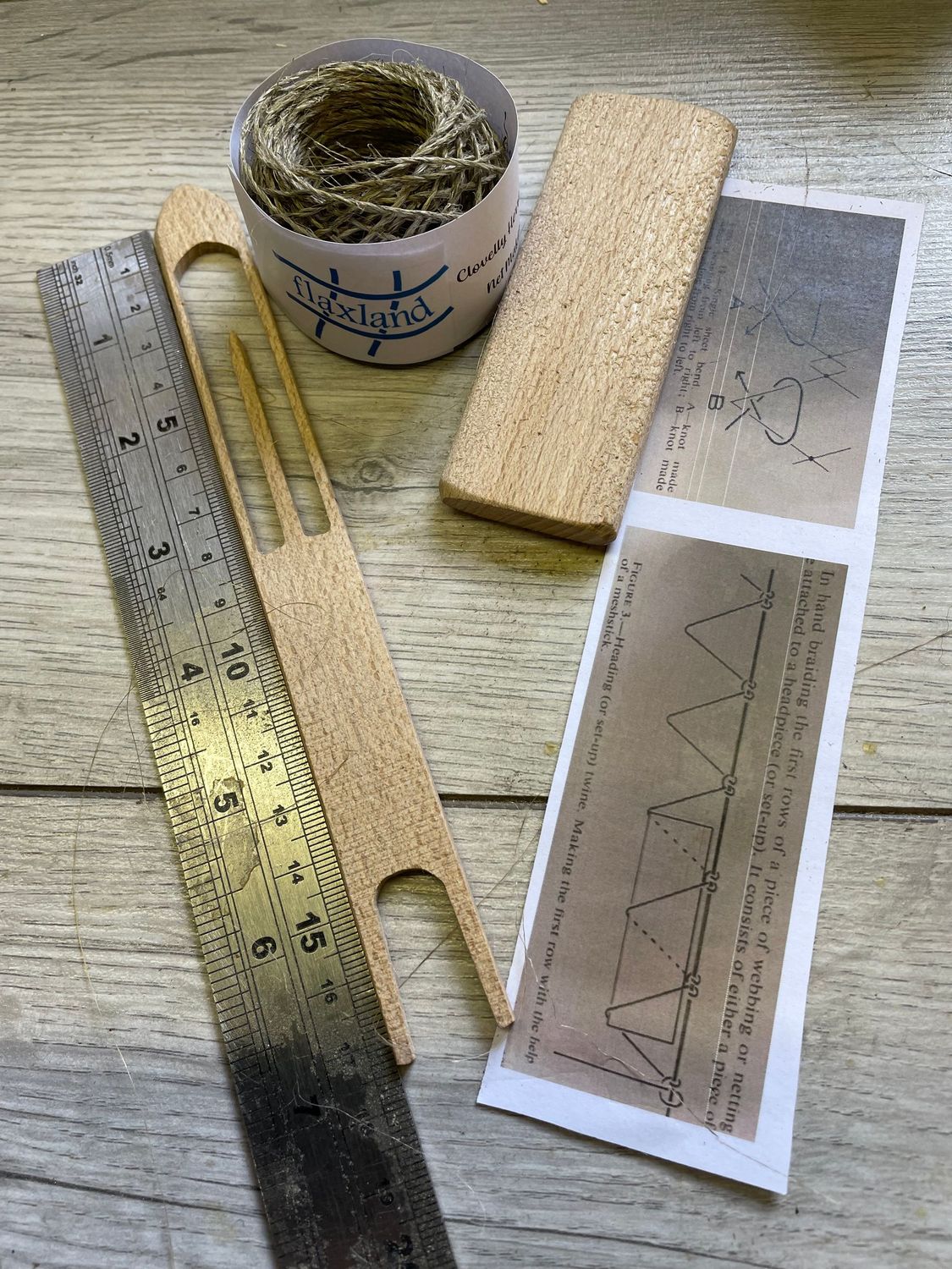 Netting needle,  gauge pin and flax twine