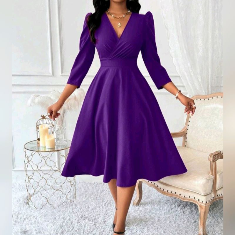 Deep V-Neckline, Cinched Waist Dress