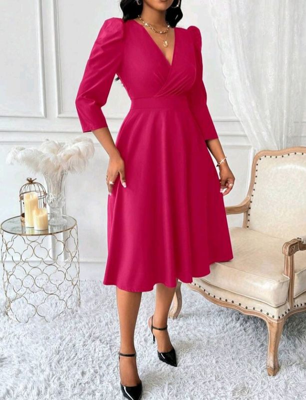 Deep V-Neckline, Cinched Waist Dress