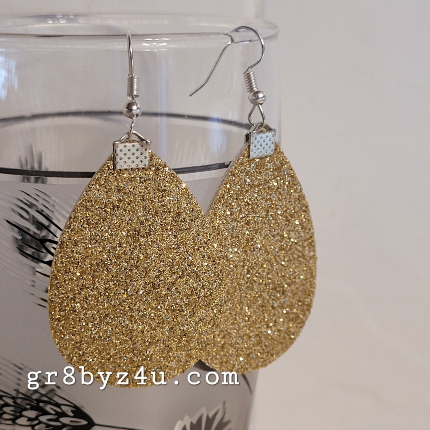 Gold glitter faux leather earrings