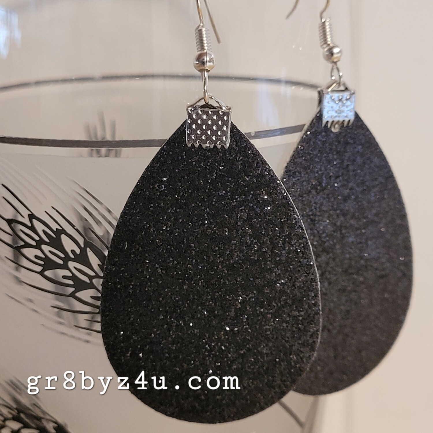 Black glitter faux leather earrings