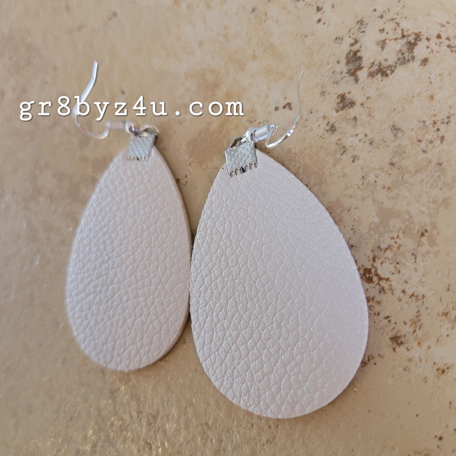 White faux leather earrings
