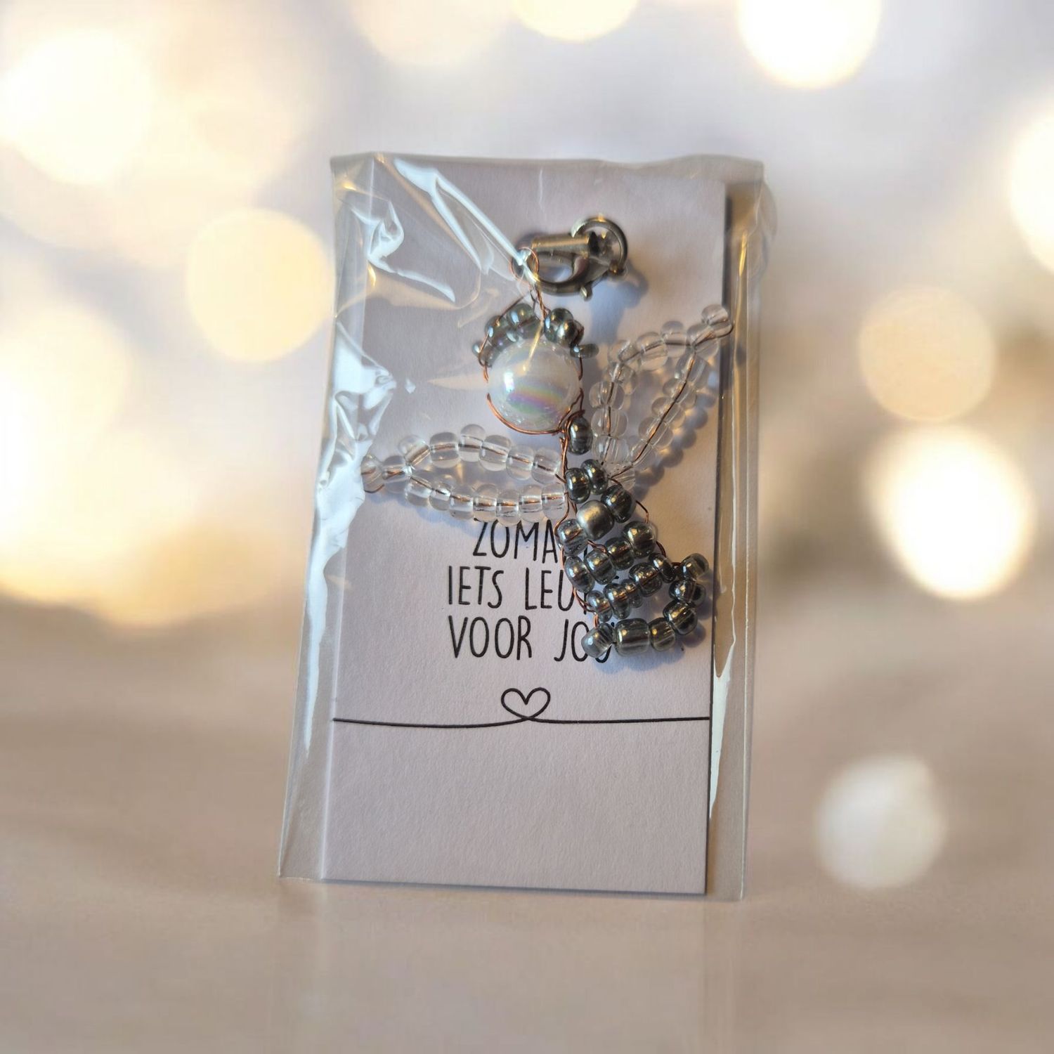 Kralen engel - kerstboom hanger - grijs. Kralen engel - kerstboom hanger - grijs.