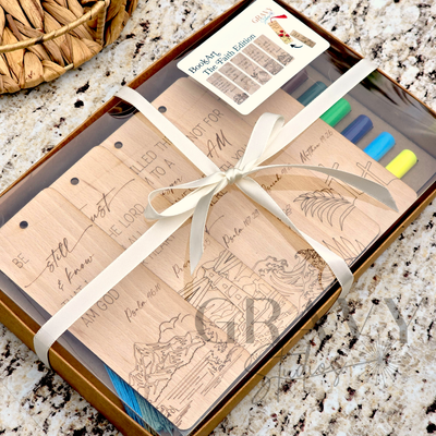 a packaged set of 5 wooden bookmarks