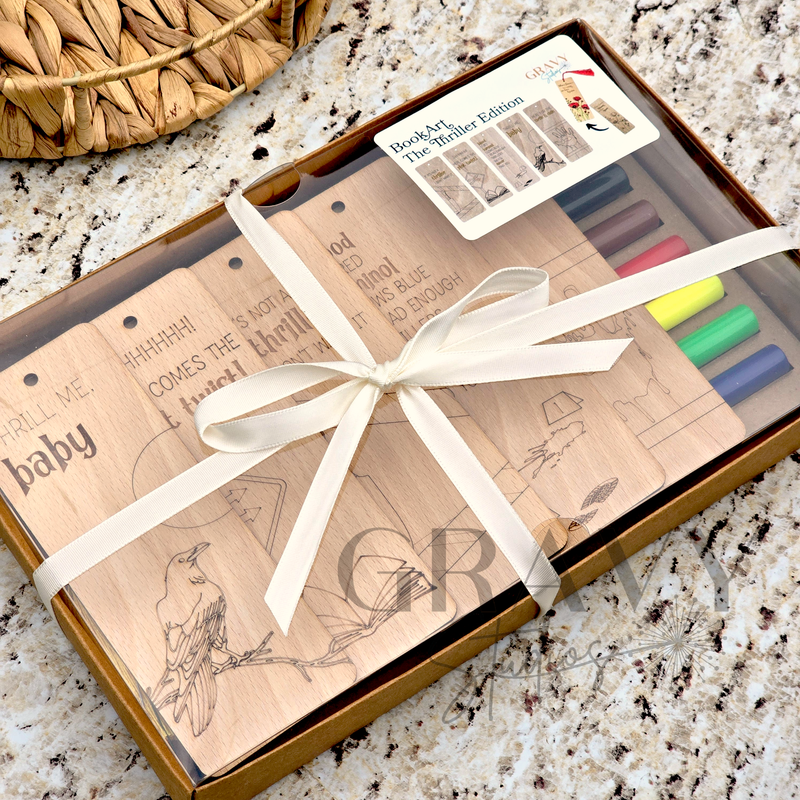 a packaged set of wooden bookmarks