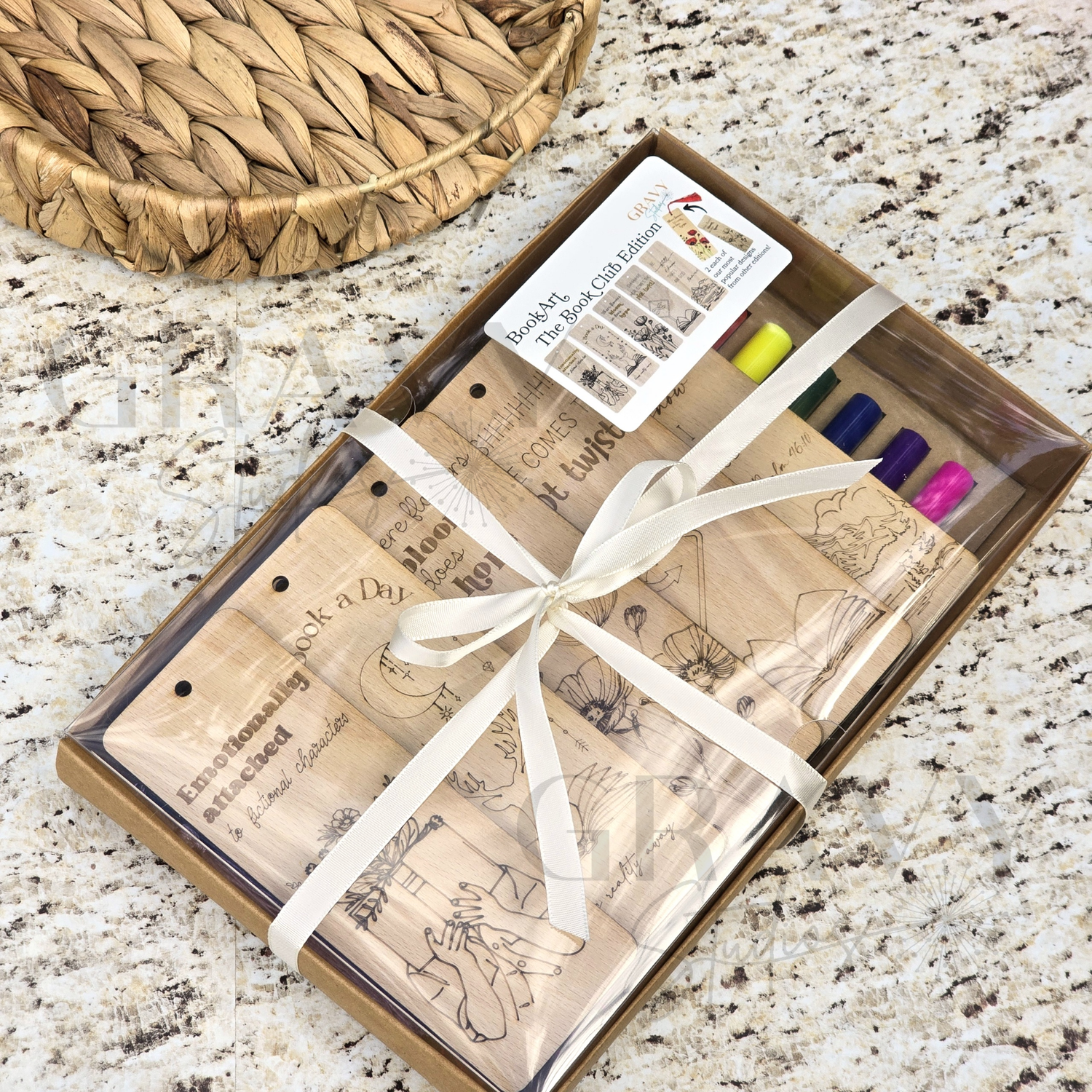 a packaged set of wooden book marks