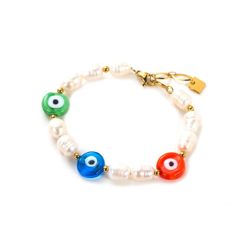 Armband mit Farandole - und  Nazar motiv aus Süßwasserperlen - Mehrfarbig​