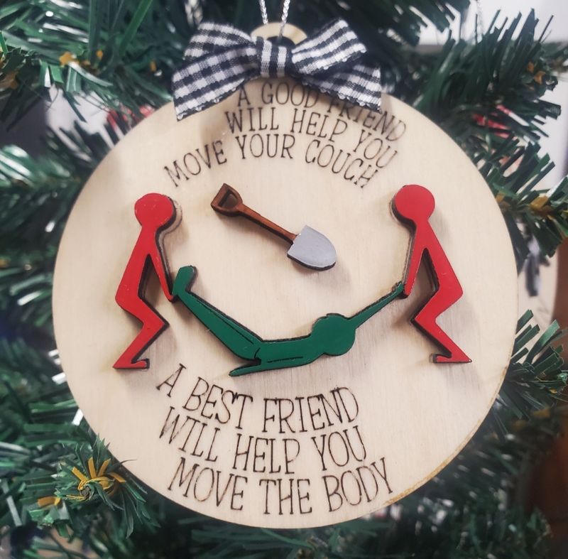 Friends Help Move a Body Ornament