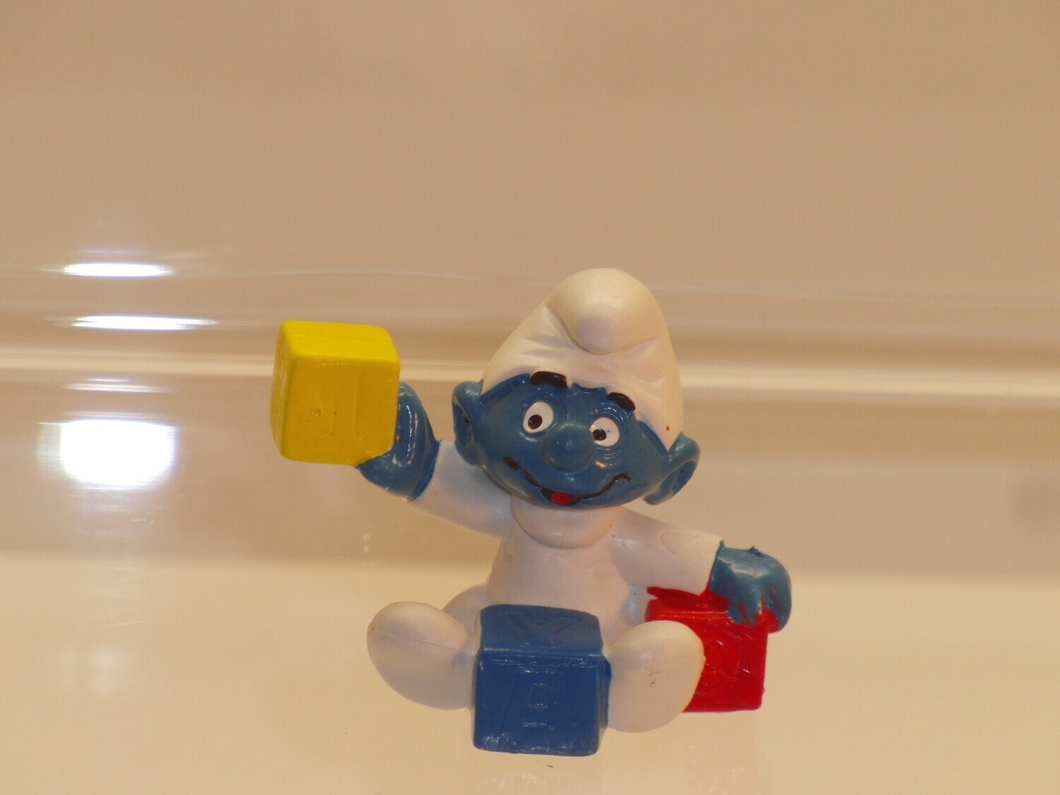Babyschlumpf mit Bauklötzen 2.0214 Strampler weiß, Klötze gelb, blau rot