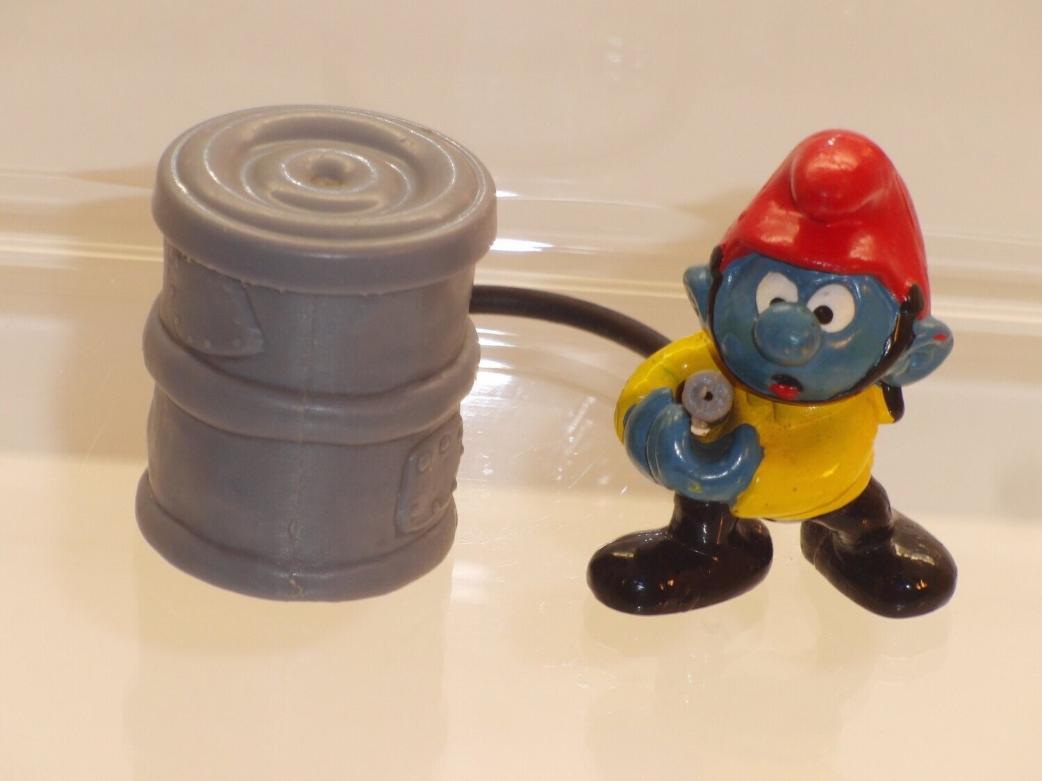 Feuerwehrschlumpf 4.0216 Jacke gelb, Helm rot