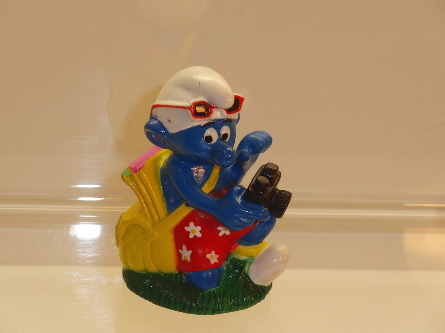 Süßigkeitentopper: Schlumpf als Tourist