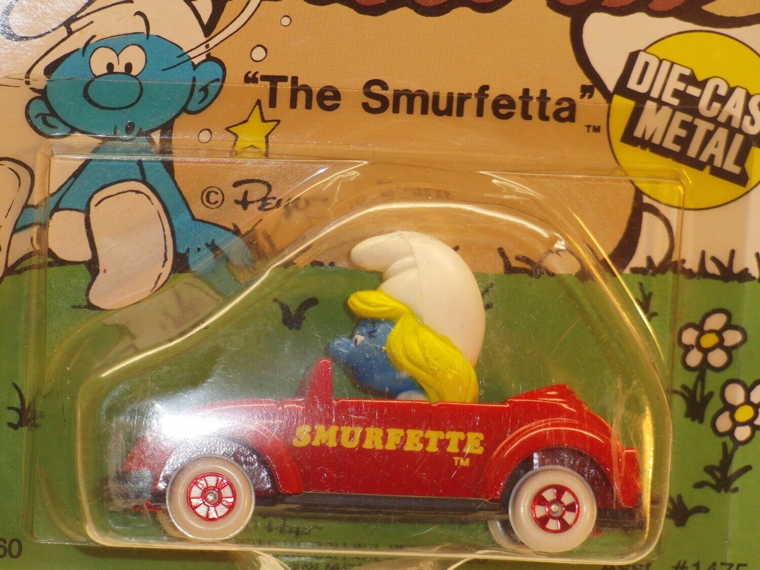 Fahrzeuge: Schlumpfinchen im Auto (ERTL 1982) in Verpackung