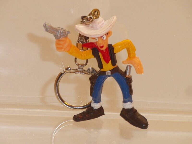 Lucky Luke: Comansi: Lucky Luke mit Colt (Schlüsselanhänger) Lucky Luke: Comansi: Lucky Luke mit Colt (Schlüsselanhänger)